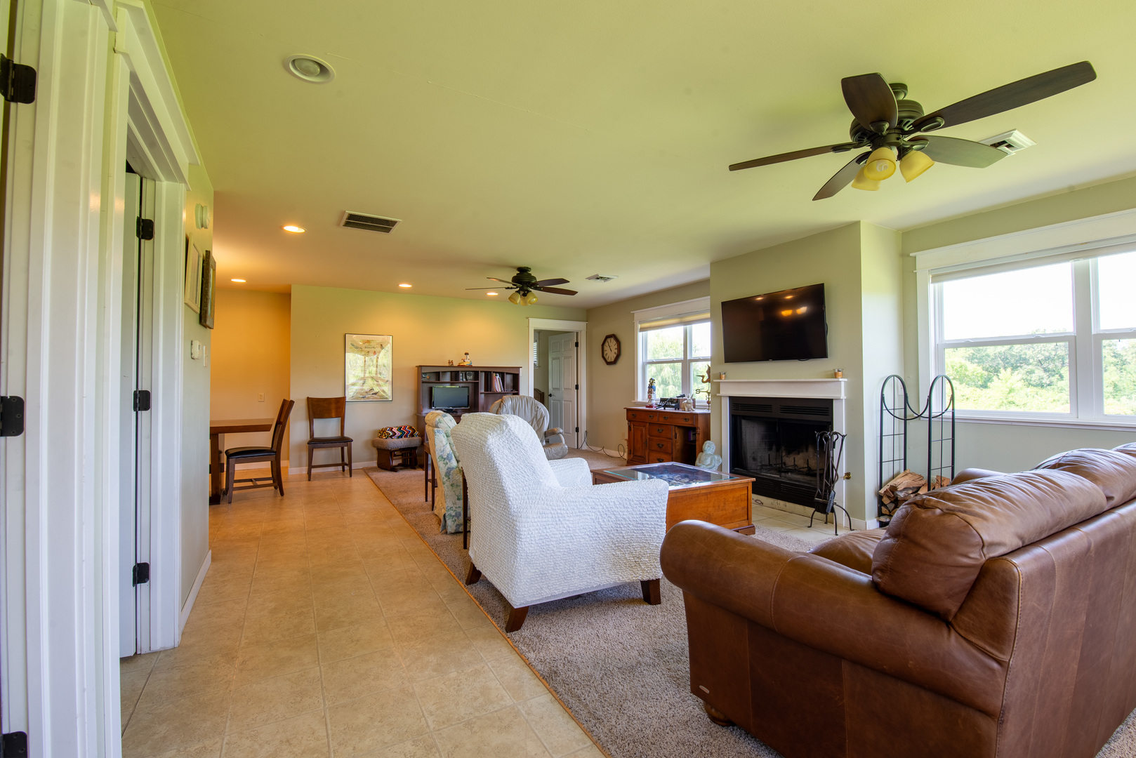 9109 Messmer Road Savanna, IL 61074 - Photo 23 of 31 a living room with furniture and a fireplace