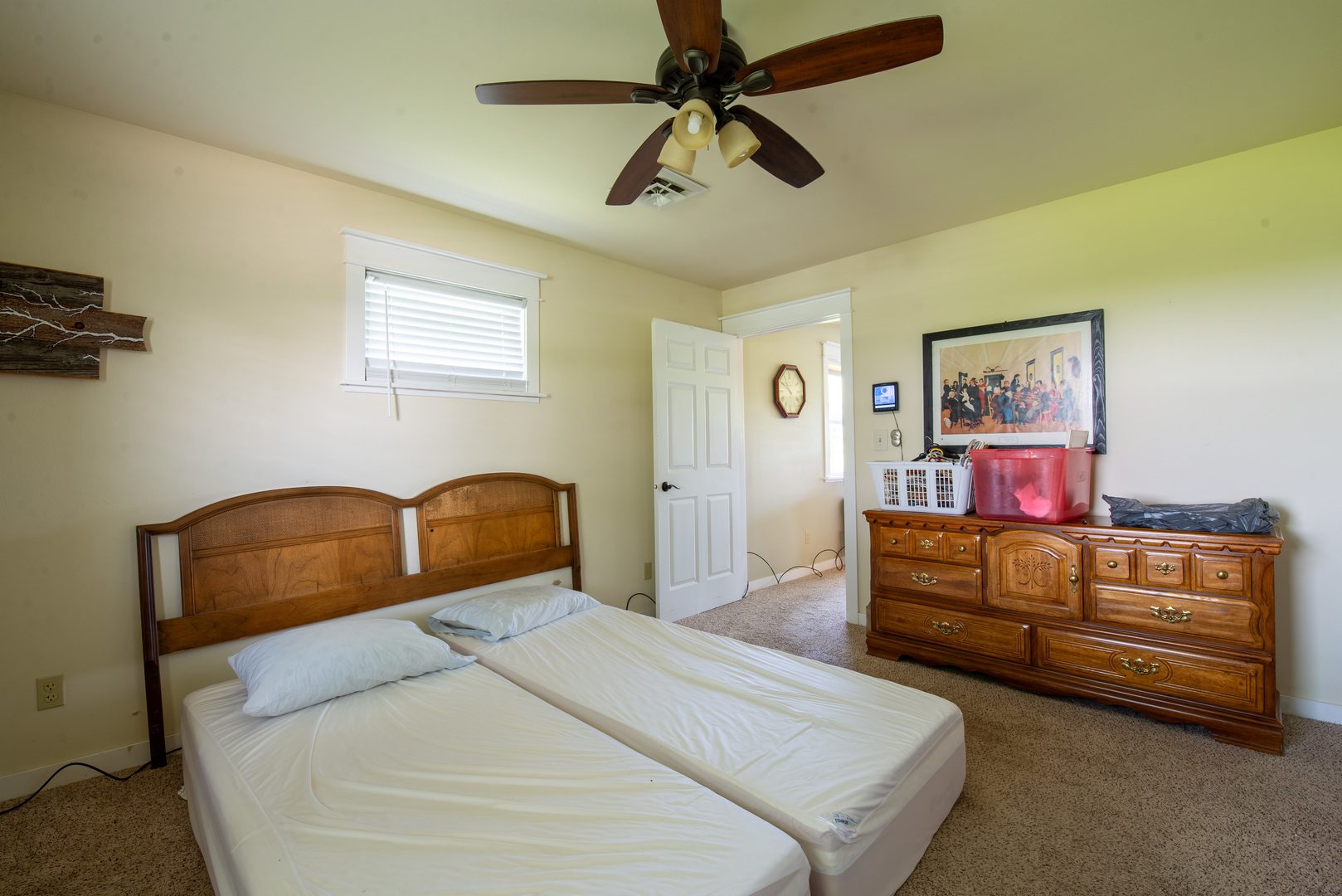 9109 Messmer Road Savanna, IL 61074 - Photo 25 of 31 a bedroom with a bed and a chandelier