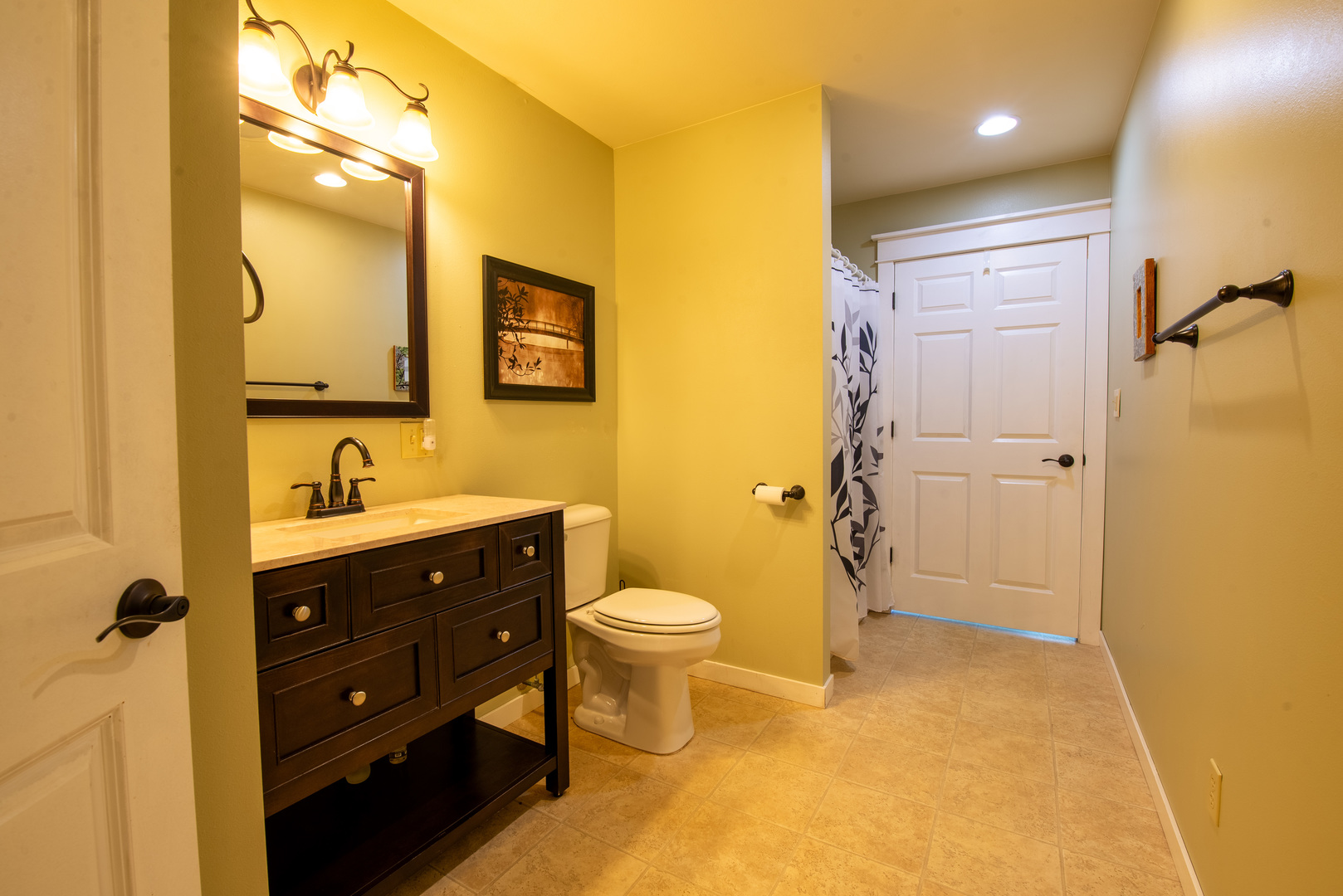 9109 Messmer Road Savanna, IL 61074 - Photo 27 of 31 a bathroom with a double vanity sink toilet mirror and shower
