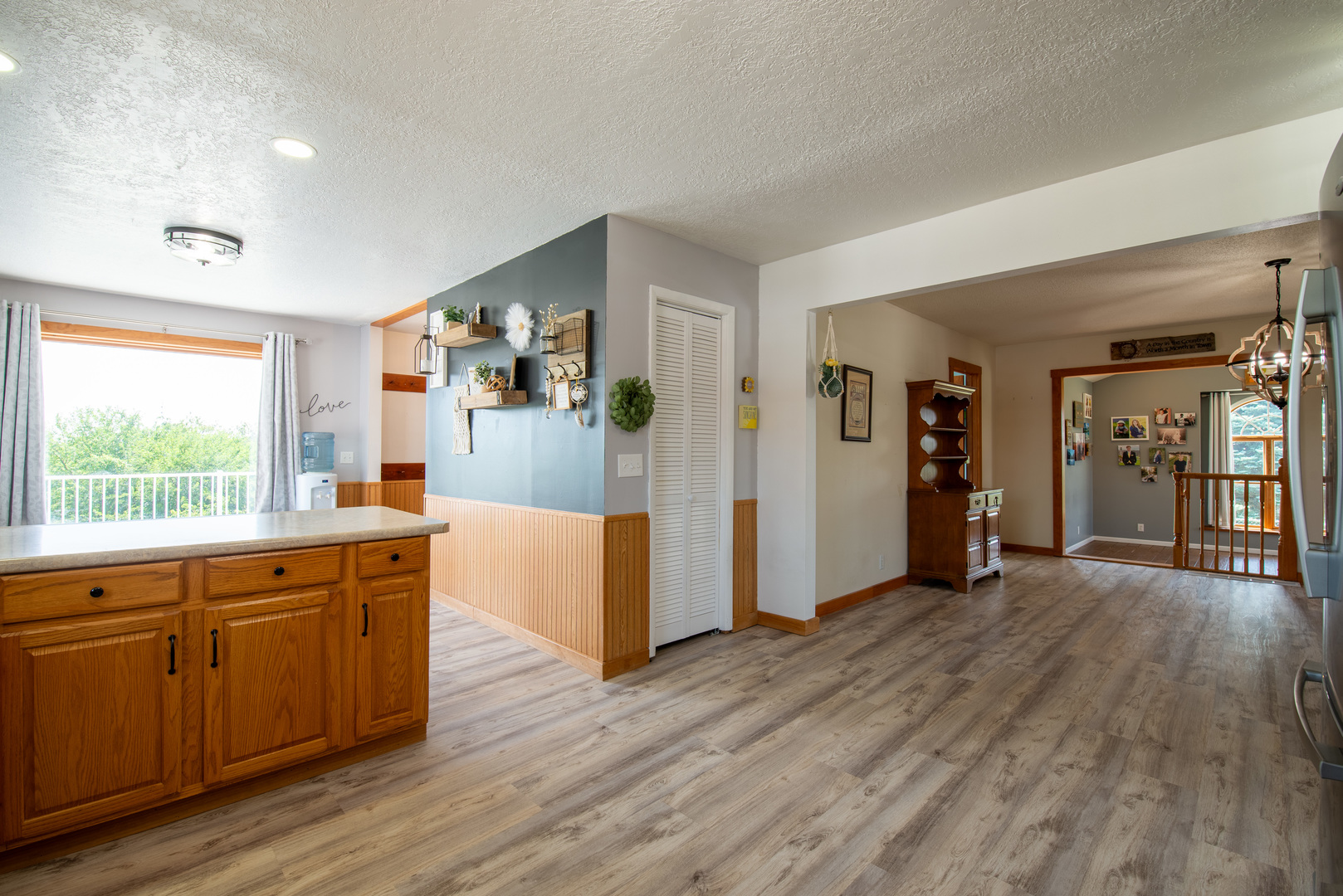 9109 Messmer Road Savanna, IL 61074 - Photo 6 of 31 a large kitchen with wooden floor and floors