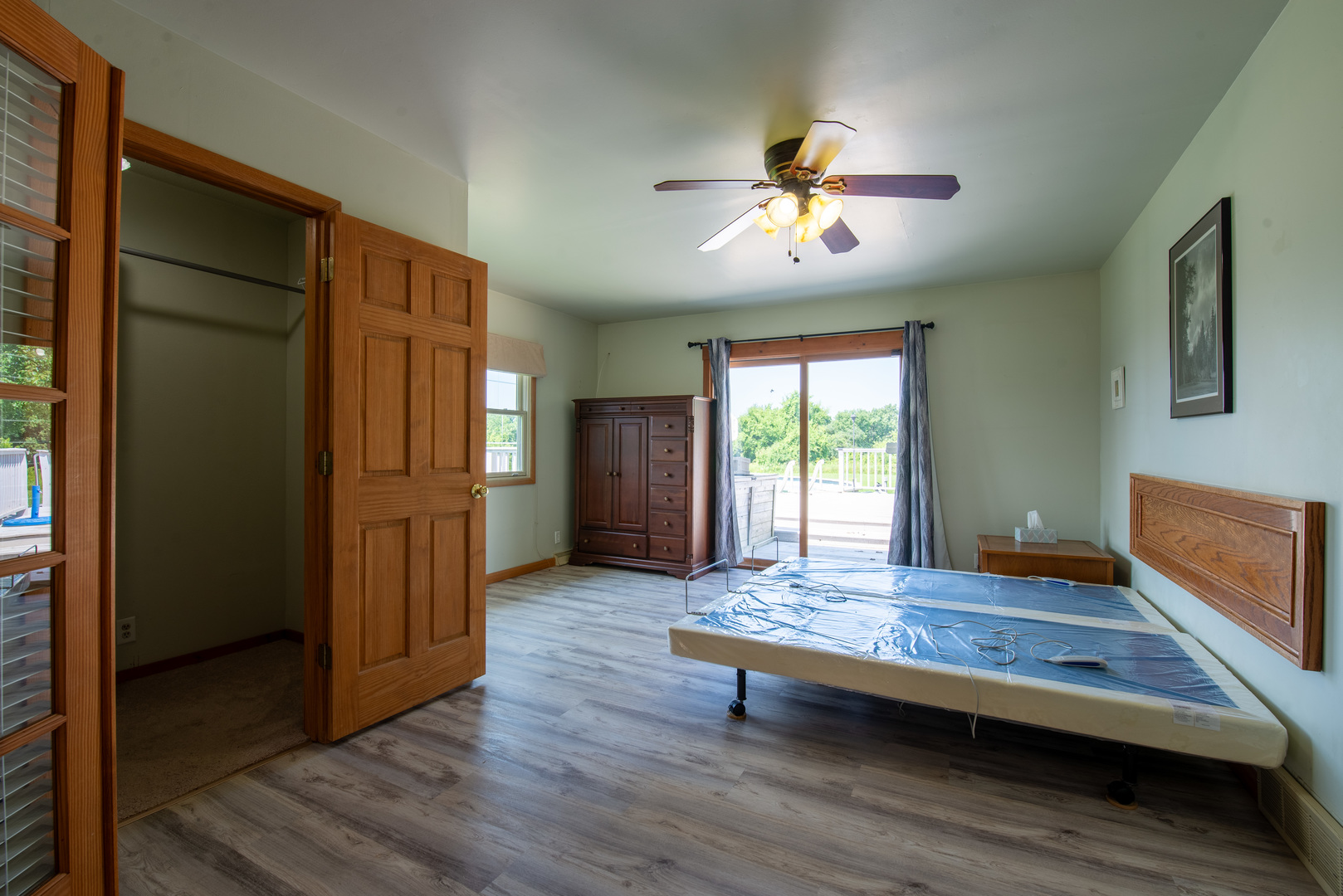 9109 Messmer Road Savanna, IL 61074 - Photo 8 of 31 a living room with wooden floor and window