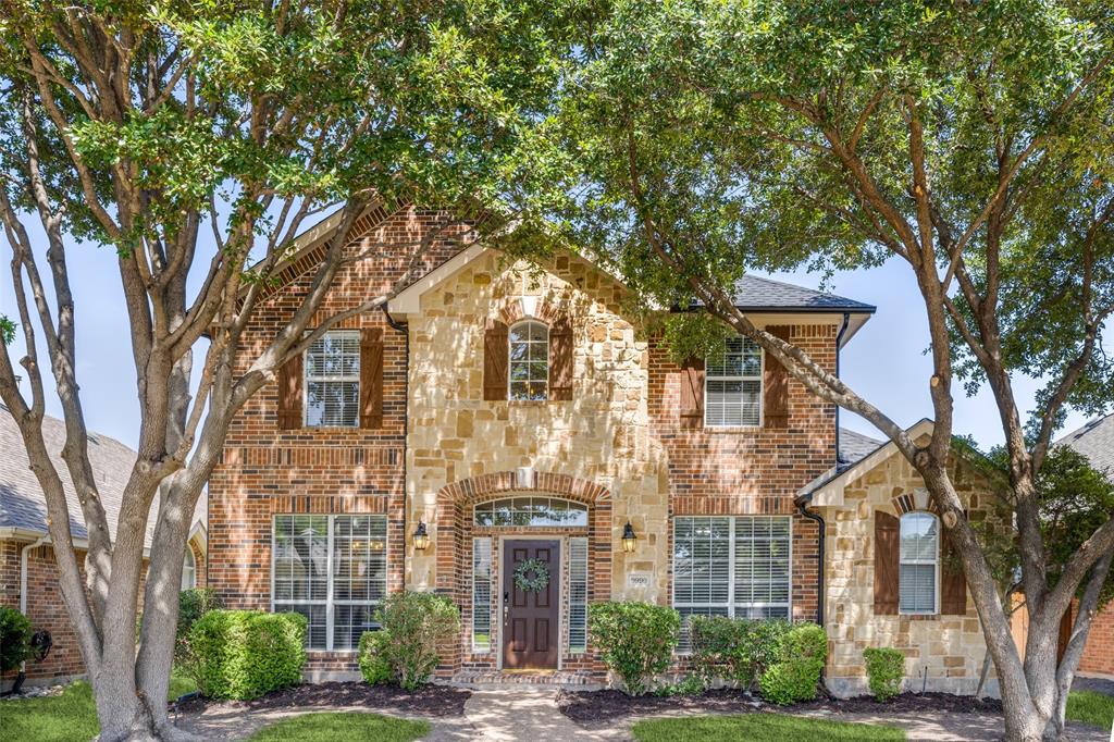 9990 Wheat Ridge Drive Frisco, TX 75033 - Photo 1 of 1 View of front property featuring large mature trees