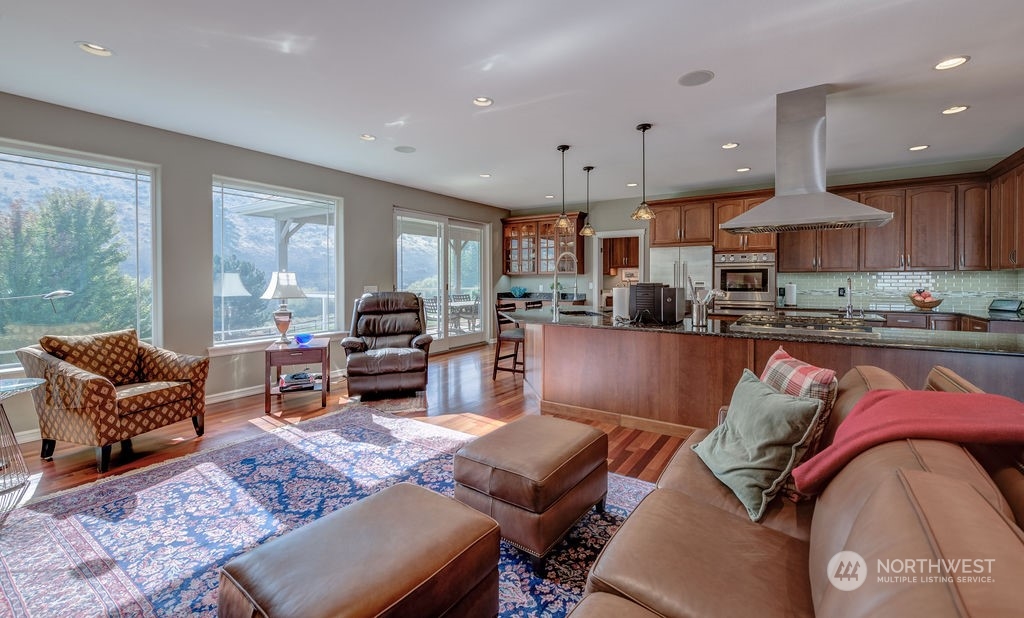 1665 Pitcher Canyon Road Wenatchee, WA 98801 - Photo 13 of 39 a living room with furniture kitchen and a large window