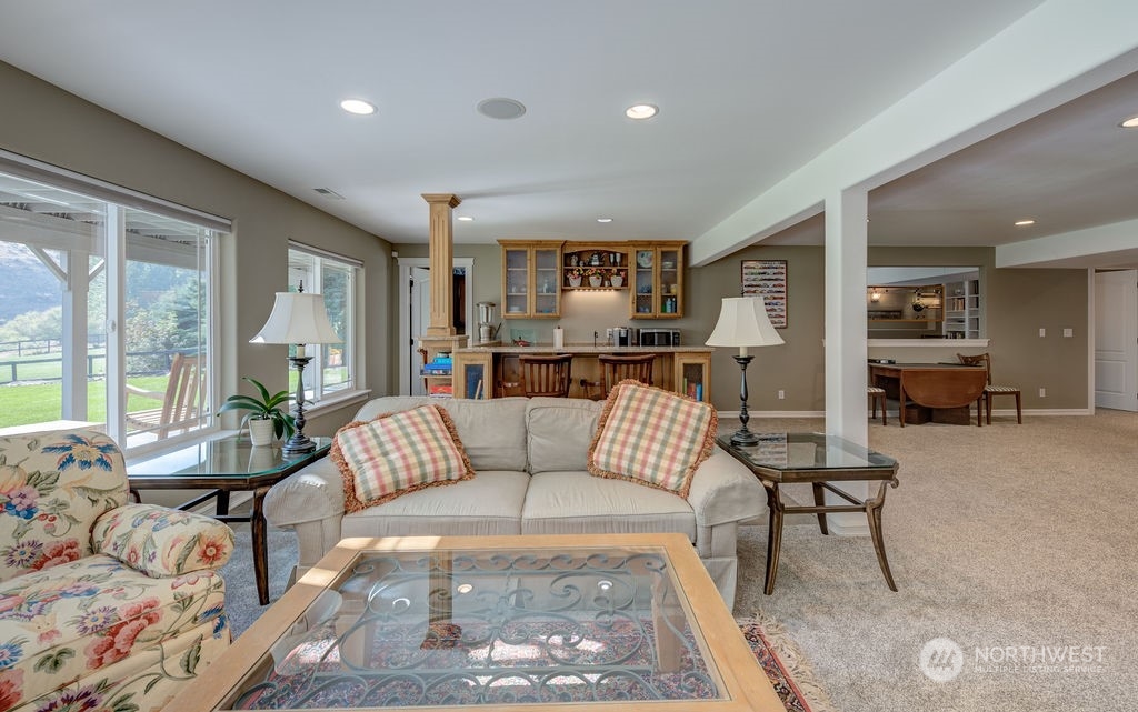 1665 Pitcher Canyon Road Wenatchee, WA 98801 - Photo 30 of 39 a living room with furniture and a large window