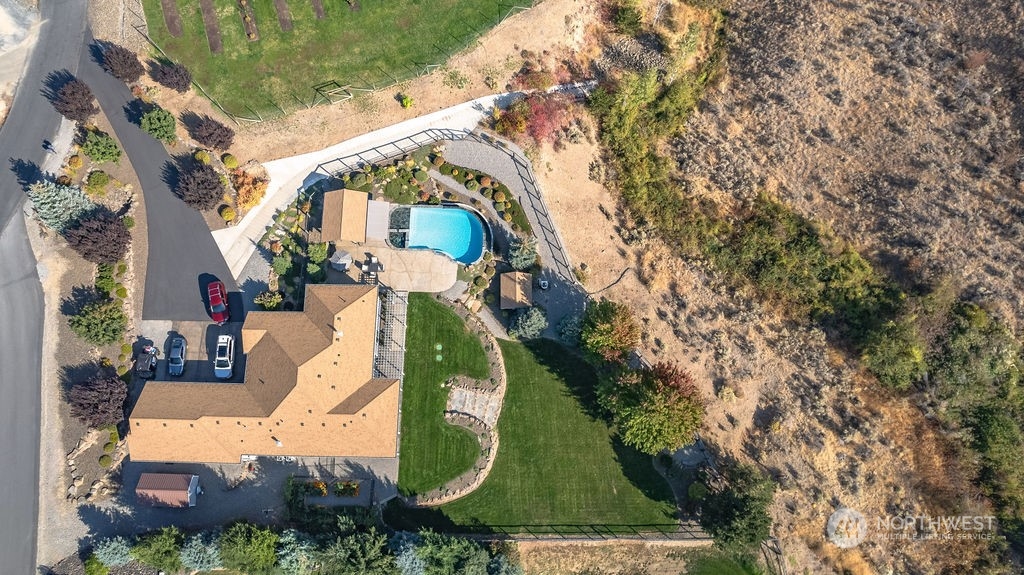 1665 Pitcher Canyon Road Wenatchee, WA 98801 - Photo 3 of 39 an aerial view of a house