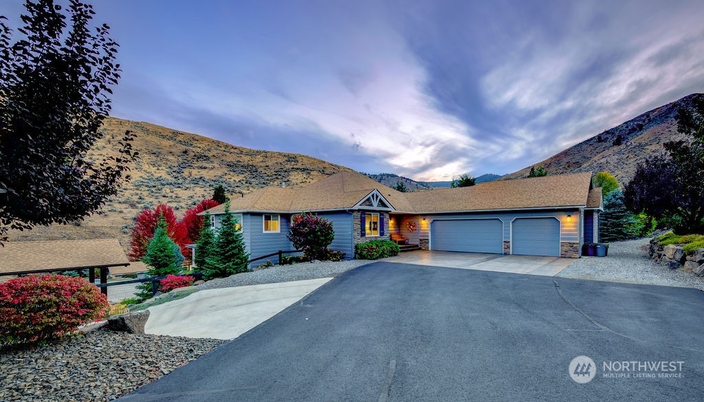 1665 Pitcher Canyon Road Wenatchee, WA 98801 - Photo 7 of 39 a view of a house with a street