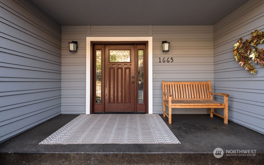 1665 Pitcher Canyon Road Wenatchee, WA 98801 - Photo 8 of 39 a view of a porch with a bench