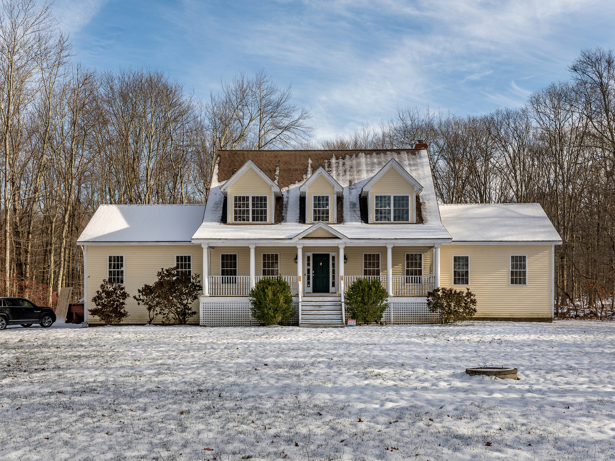 36 Sunset Lane Washington, CT 06794 - Photo 1 of 23 a front view of a house with a garden