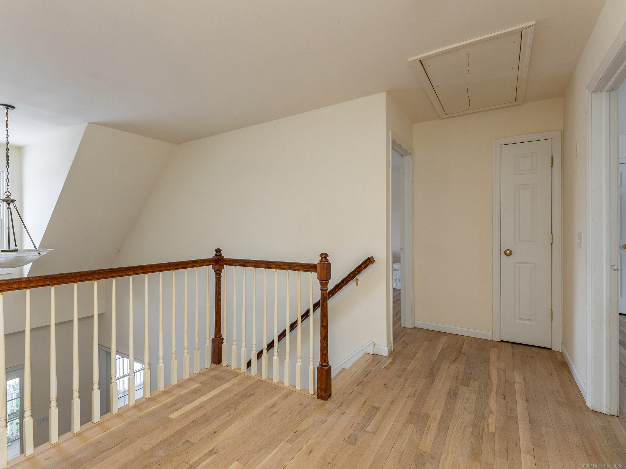36 Sunset Lane Washington, CT 06794 - Photo 17 of 23 a view of hallway with wooden floor