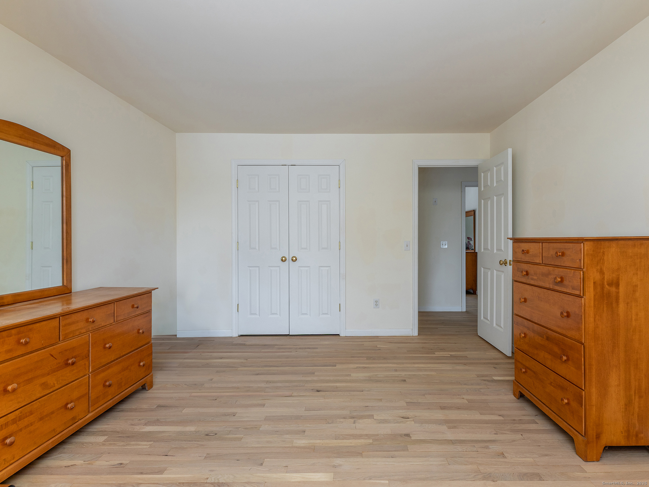36 Sunset Lane Washington, CT 06794 - Photo 21 of 23 a view of a dresser with wooden floor