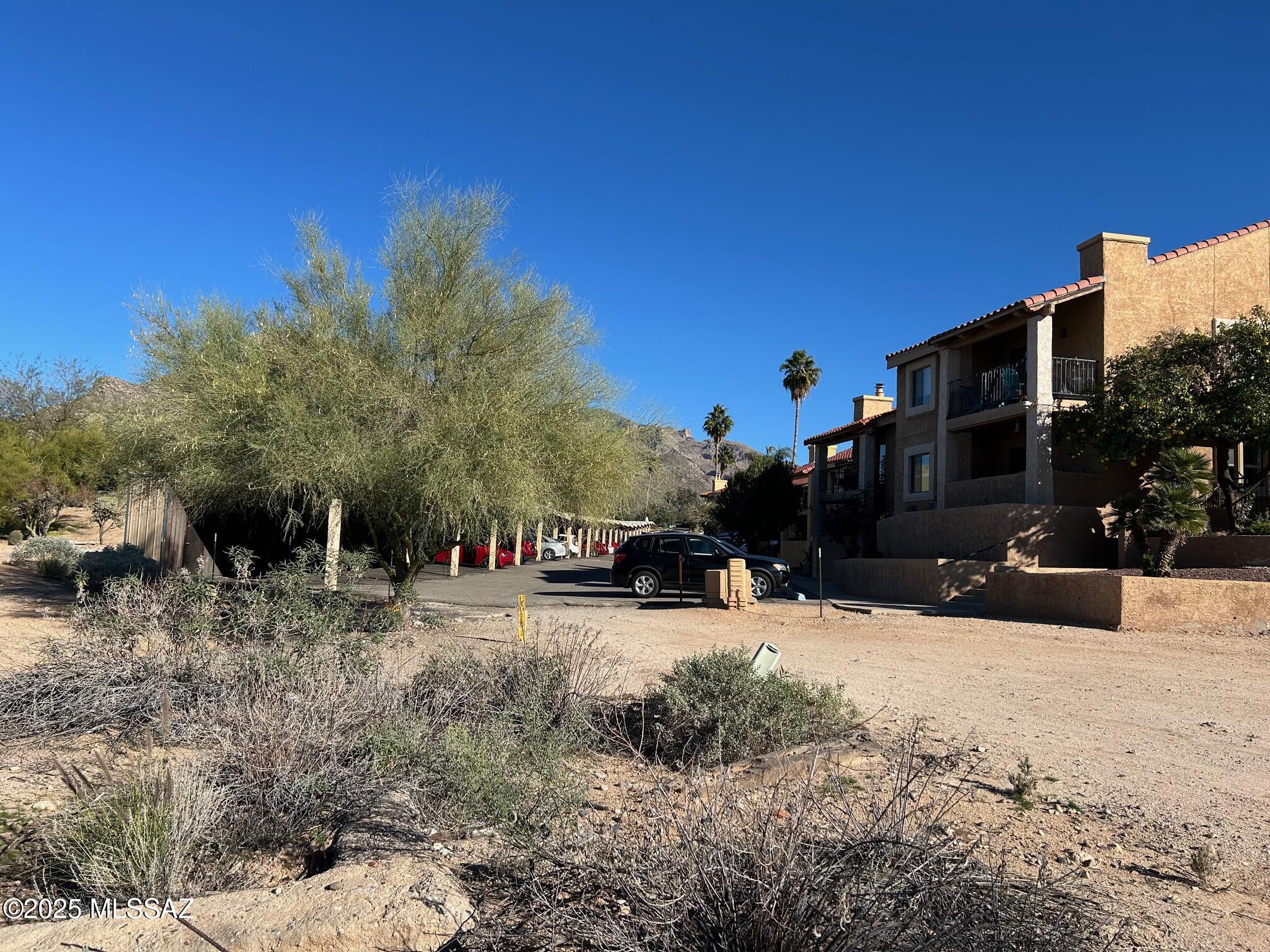 North Oracle Road, Unit 22516 Tucson, AZ 85704 - Photo 10 of 10 a view of a street with a building in the background