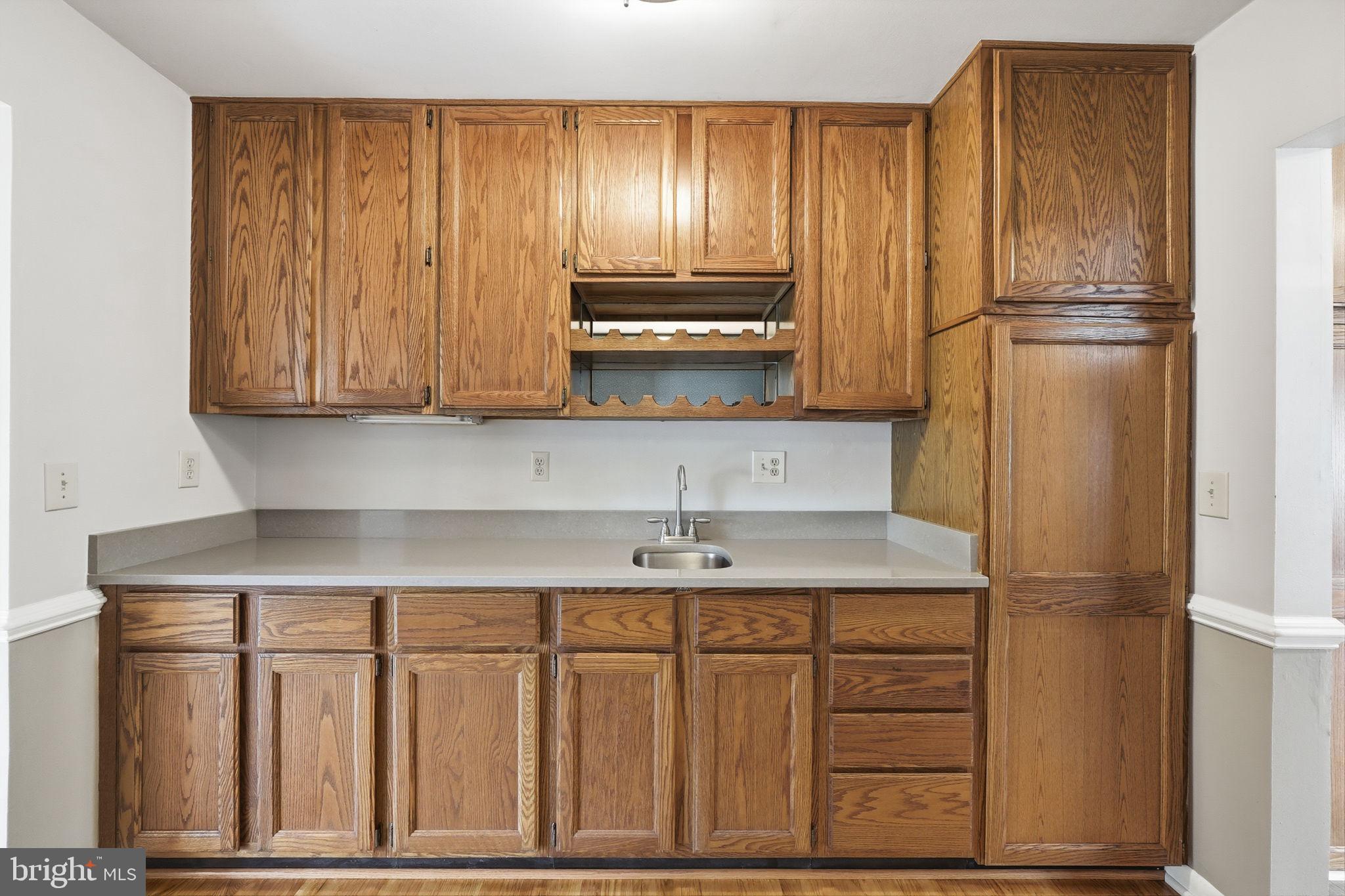 15010 Rolling Ridge Road Haymarket, VA 20169 - Photo 10 of 61 Warm wood tones in a cozy kitchen.