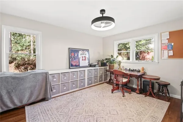 a living room with furniture and a window