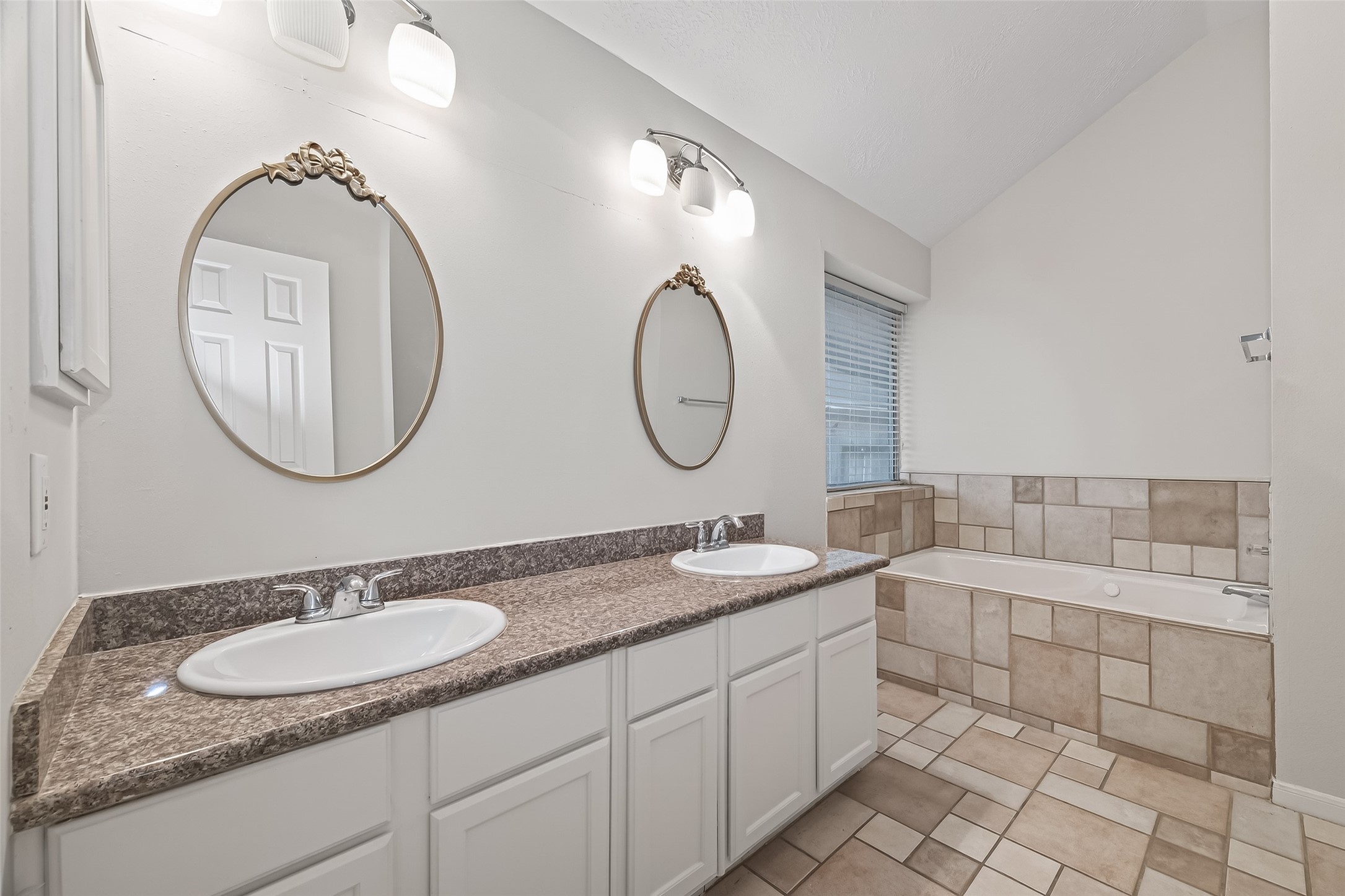 2002 Foundary Drive Katy, TX 77493 - Photo 15 of 20 a bathroom with a granite countertop double vanity sink and a mirror