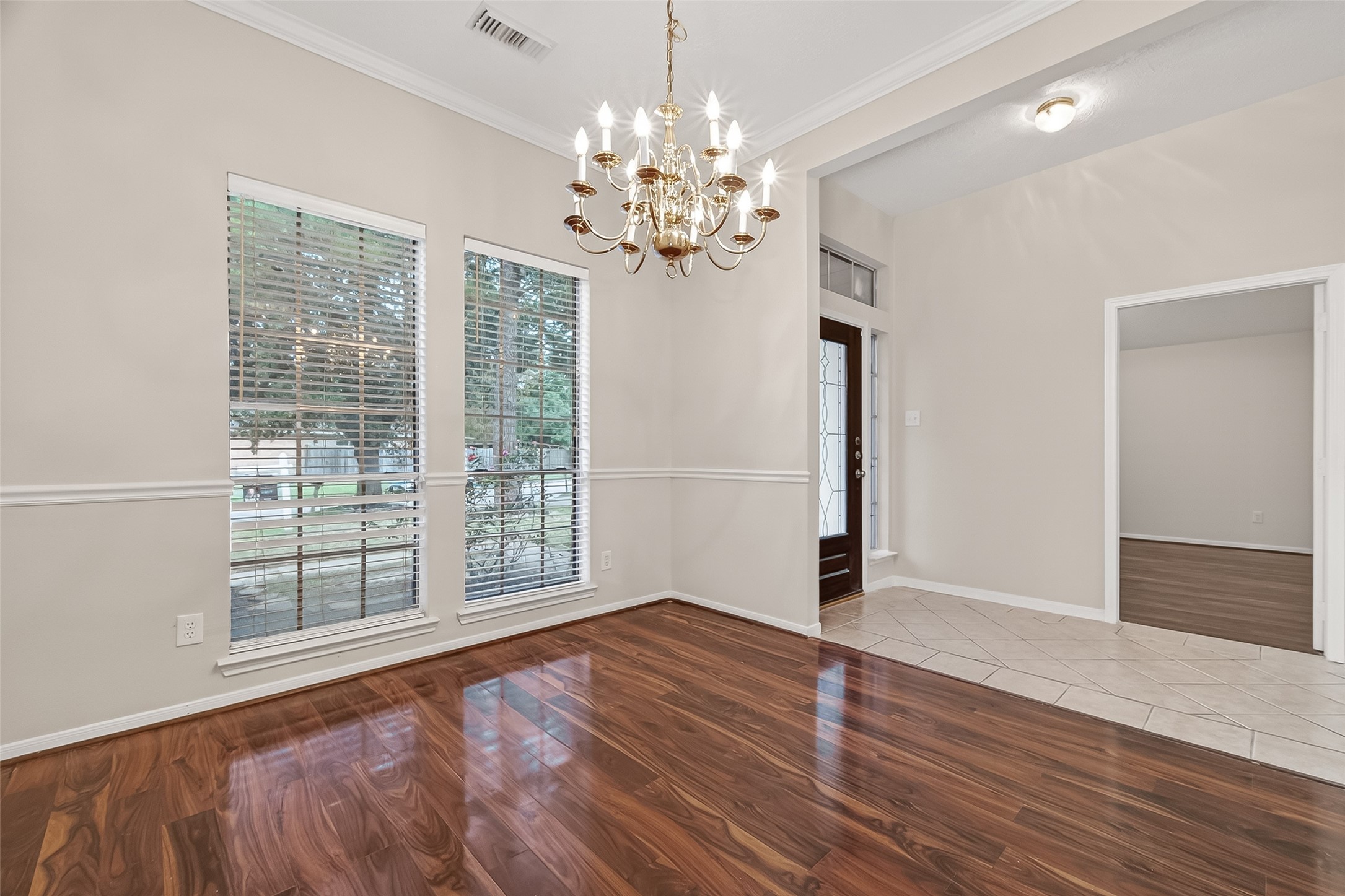 2002 Foundary Drive Katy, TX 77493 - Photo 4 of 20 a view of an empty room with wooden floor and a window