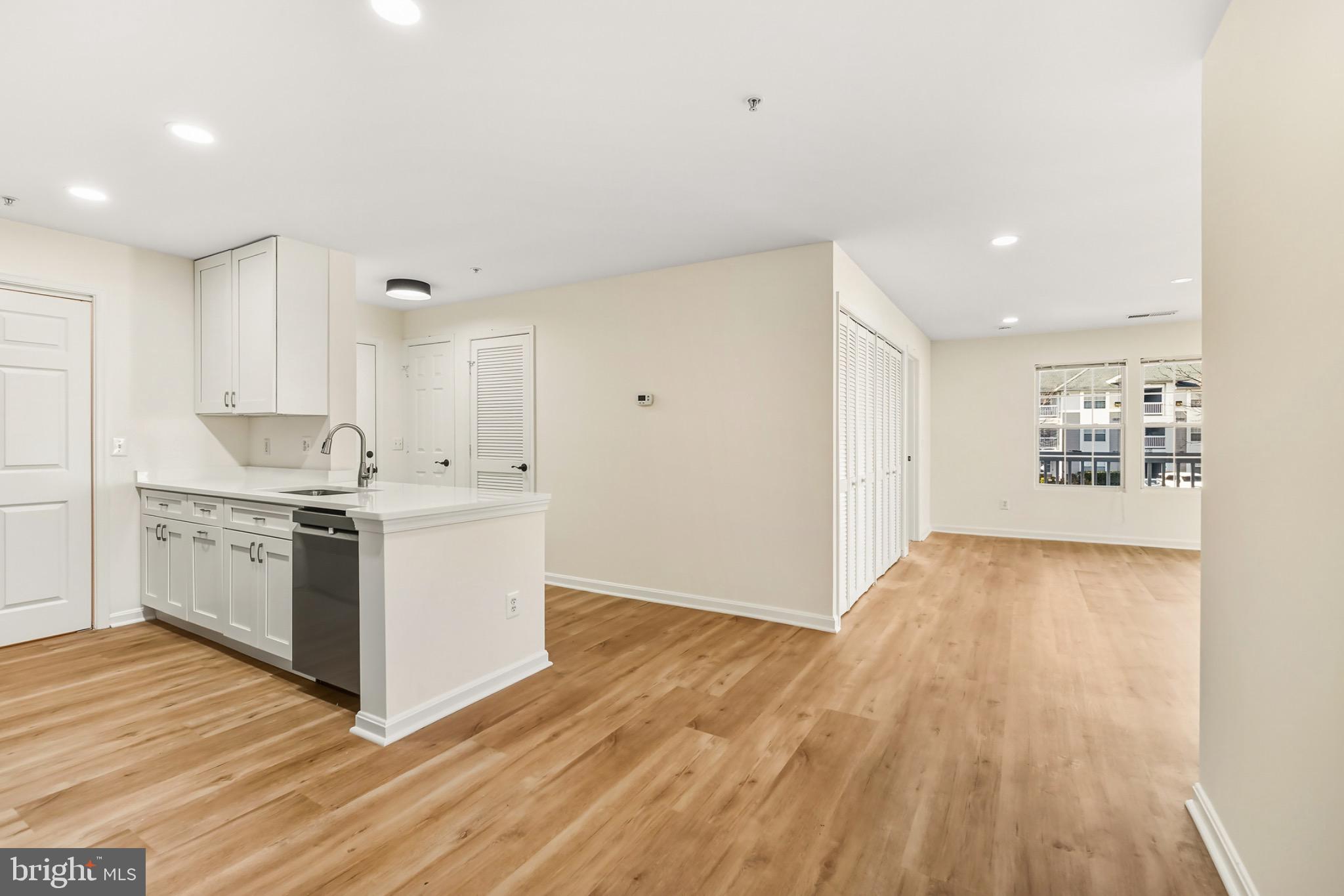 14184 Cuddy Loop, Unit 201 Woodbridge, VA 22193 - Photo 9 of 30 Spacious, modern living with natural light.