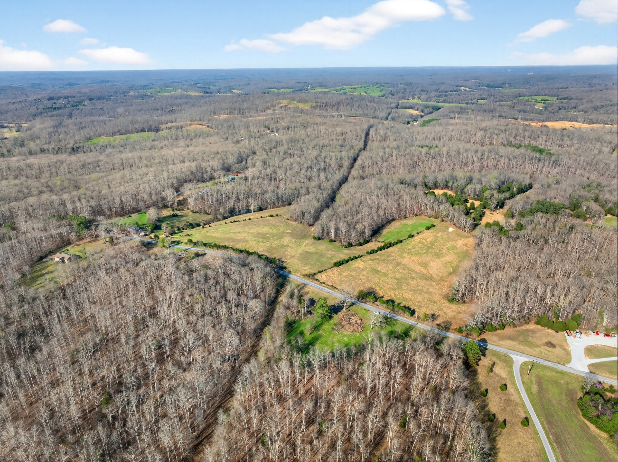 3240 Clay Tomlinson Road Erin, TN 37061 - Photo 13 of 16 a view of a yard and ocean view
