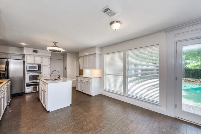 a view of a dining room with furniture