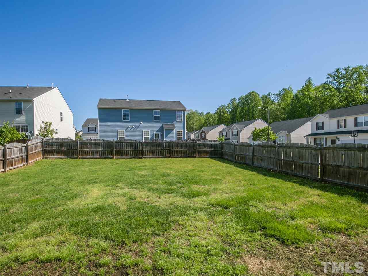 2883 Orchard Trace Way Raleigh, NC 27610 - Photo 16 of 16 Enjoy grilling and playing in your large fenced backyard.