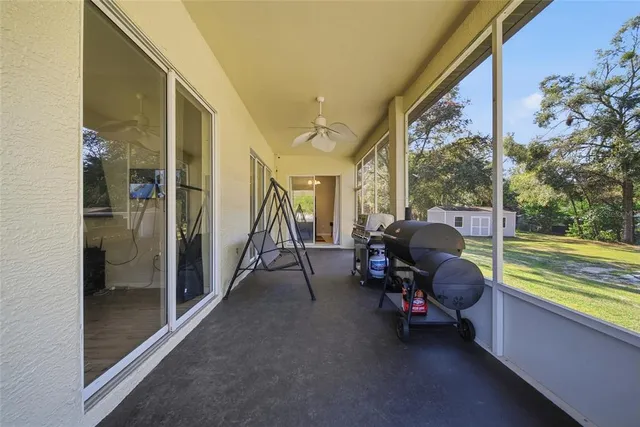 a view of swimming pool with an outdoor space and seating area