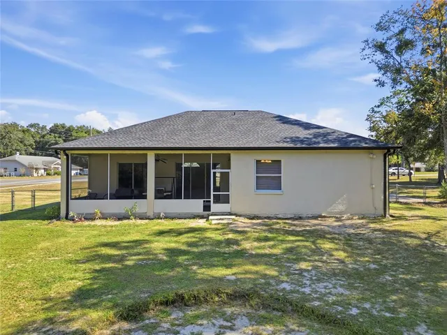 a view of a house with swimming pool