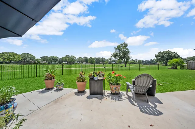 a view of a garden and basketball court