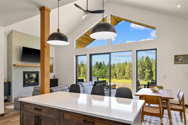 a view of a dining room with furniture window and outside view
