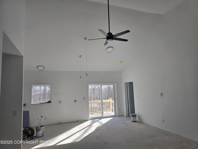 a view of empty room with windows