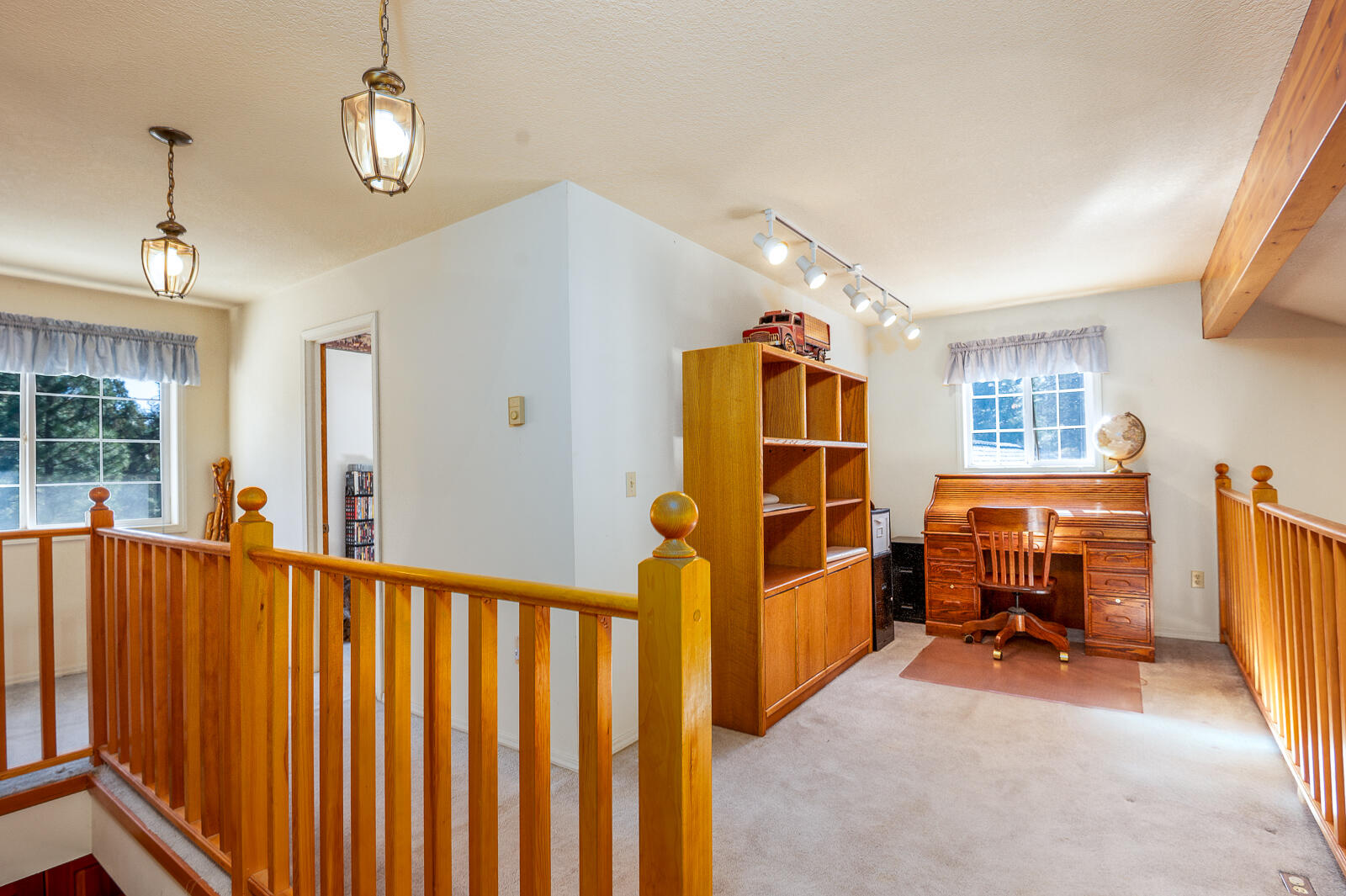 19793 Buck Canyon Road Bend, OR 97702 - Photo 12 of 33 a view of livingroom with furniture and windows