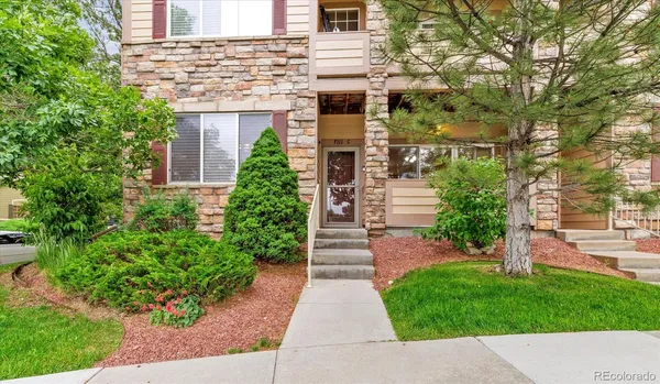 a picture of a house with a yard