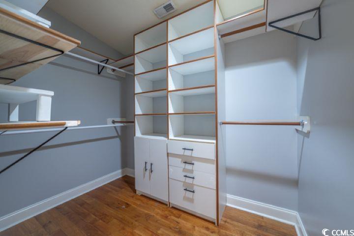936 Oak Ridge Place Myrtle Beach, SC 29572 - Photo 22 of 36 Walk in closet with light wood-type flooring