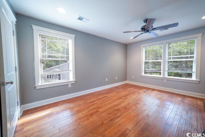 936 Oak Ridge Place Myrtle Beach, SC 29572 - Photo 24 of 36 Spare room featuring light wood finished floors, plenty of natural light, ceiling fan, and recessed lighting
