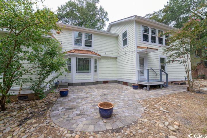 936 Oak Ridge Place Myrtle Beach, SC 29572 - Photo 3 of 36 Rear view of property with a patio and crawl space