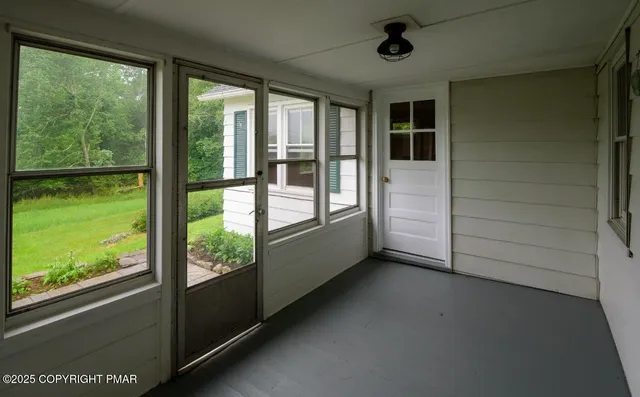 a view of room with a large window