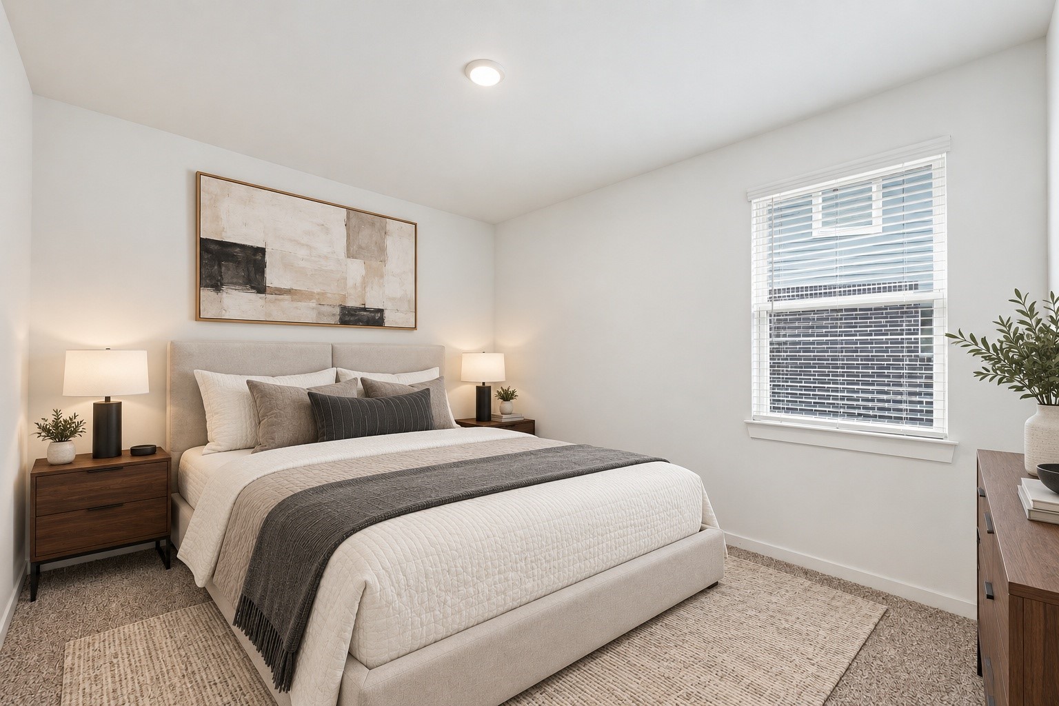 14162 Primrose Ridge Lane Conroe, TX 77384 - Photo 33 of 48 Experience the serene elegance of this beautifully staged bedroom, featuring a cozy bed with neutral tones and warm lighting that invites relaxation.