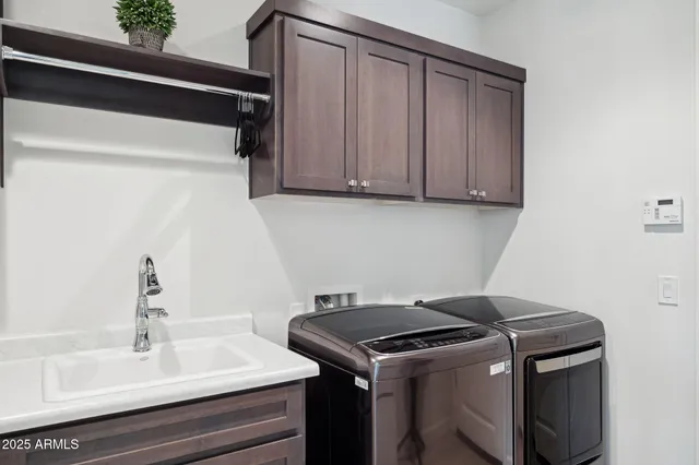a view of a terrace with a table and chairs