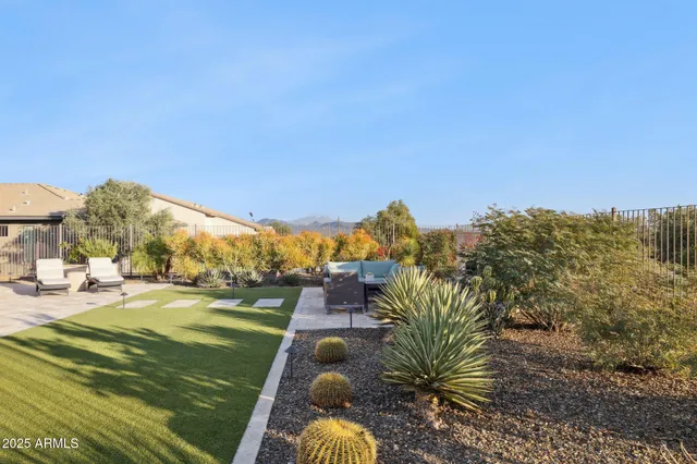 a view of a patio with a yard