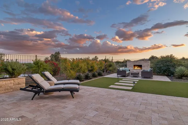 a living room with furniture fireplace and flat screen tv