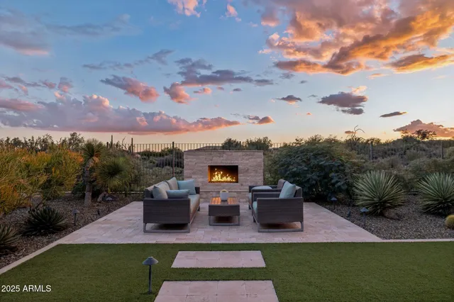 an aerial view of a house with outdoor space