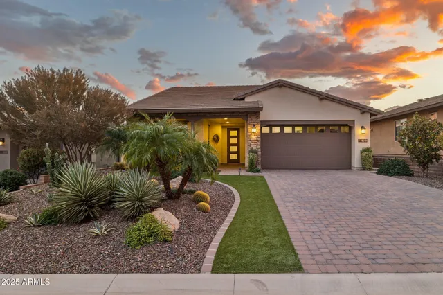 a view of a backyard of the house