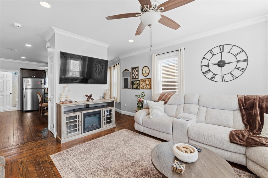233 Belleville Road New Bedford, MA 02745 - Photo 13 of 40 a living room with furniture and a flat screen tv