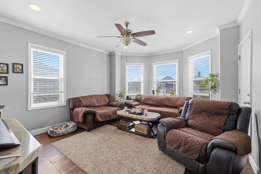 233 Belleville Road New Bedford, MA 02745 - Photo 25 of 40 a living room with furniture and a window