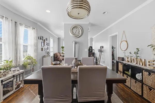 a bedroom with a bed and a television