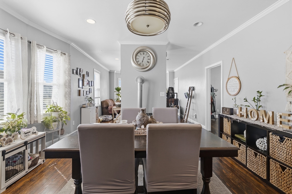 233 Belleville Road New Bedford, MA 02745 - Photo 29 of 40 a view of a dining room with furniture window and wooden floor