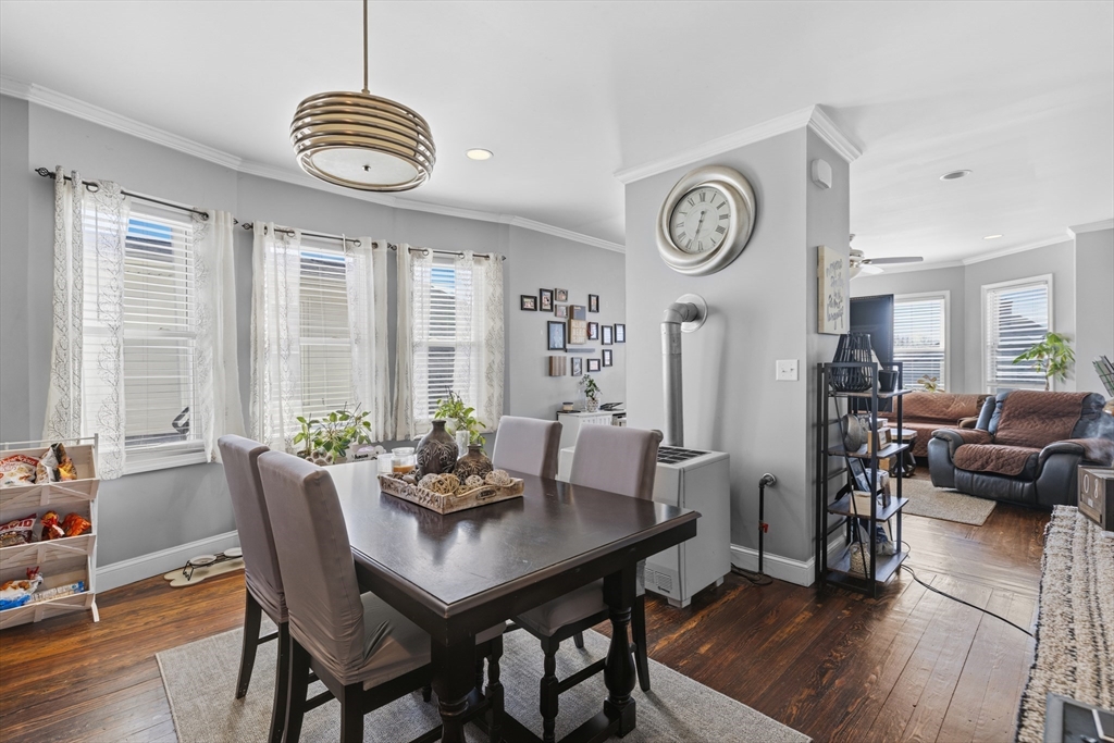 233 Belleville Road New Bedford, MA 02745 - Photo 30 of 40 a view of a dining room with furniture window and wooden floor