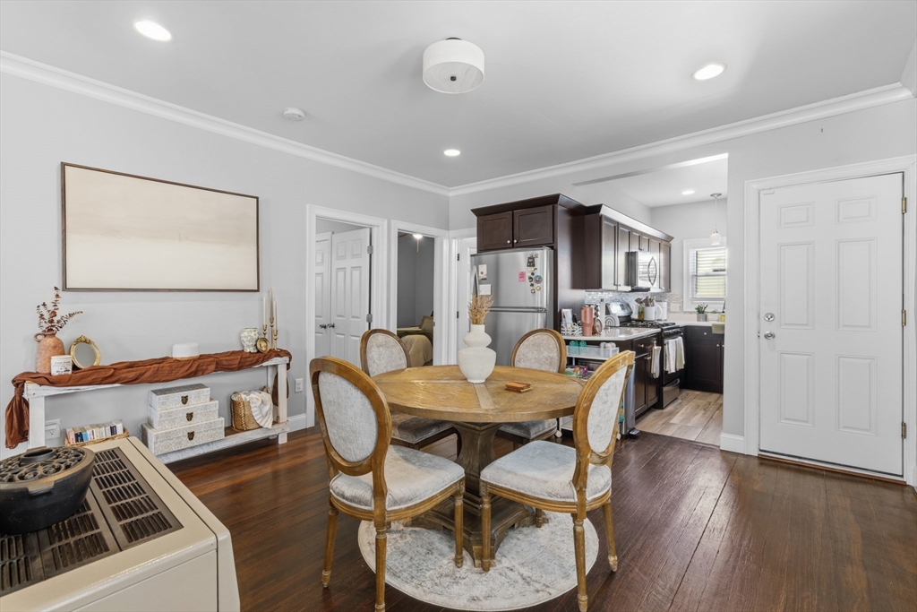 233 Belleville Road New Bedford, MA 02745 - Photo 6 of 40 a view of a dining room with furniture and wooden floor