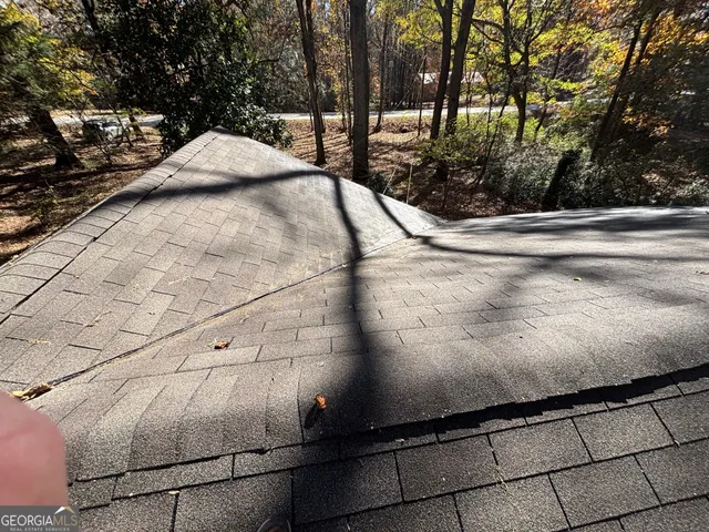 a view of a yard with chairs