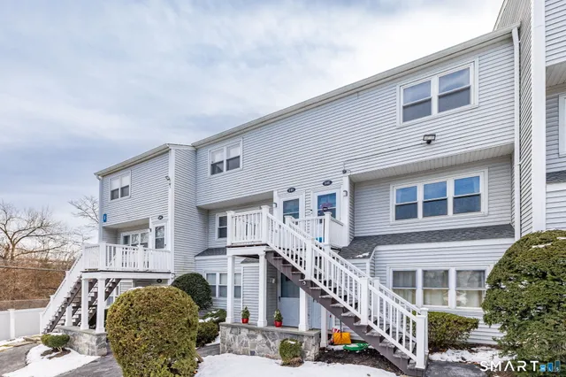 a front view of a building with glass windows