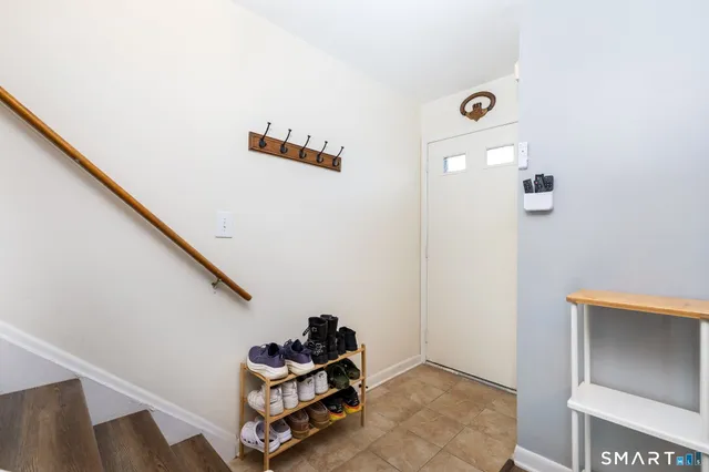 a room with toys and stairs