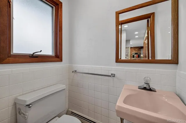 a bathroom with a bathtub and a sink